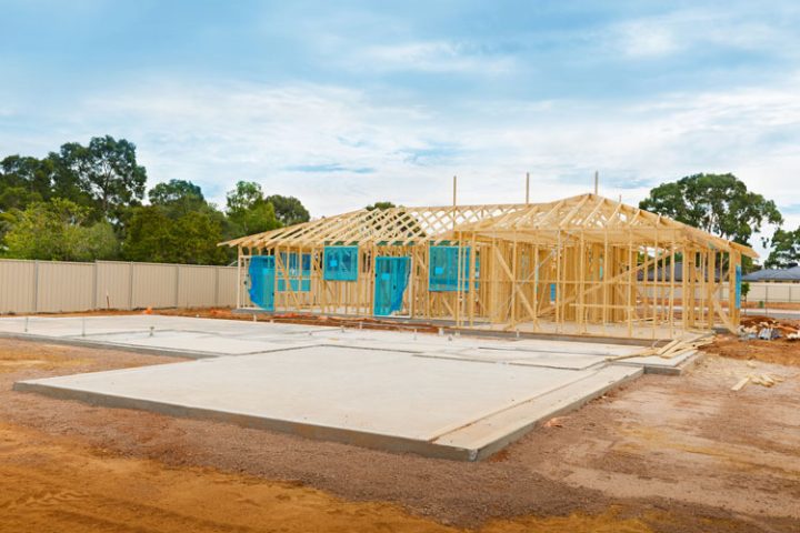 house slab foundation and wood post frames